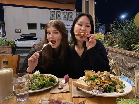 Editors Sylvie Richards and Sierra Kim-Tran eat their crepe and salad, rating them a 6 out of 10.