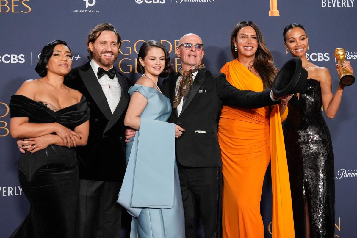 The cast of Emilia Pérez celebrating their wins at the Golden Globes